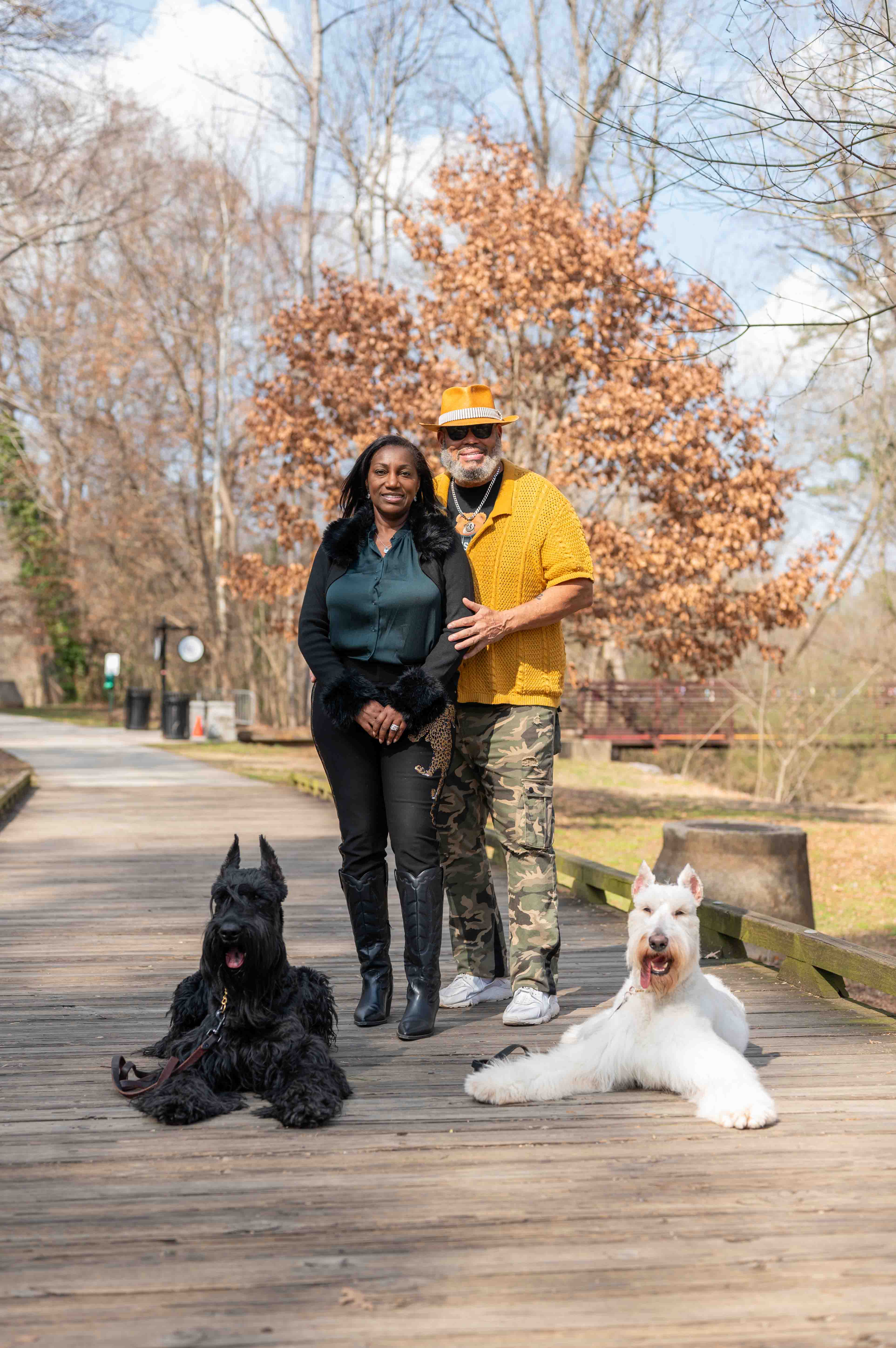 Blake and Sheila Rashad, founders of Top Dogg K9 Foundation, with their dogs